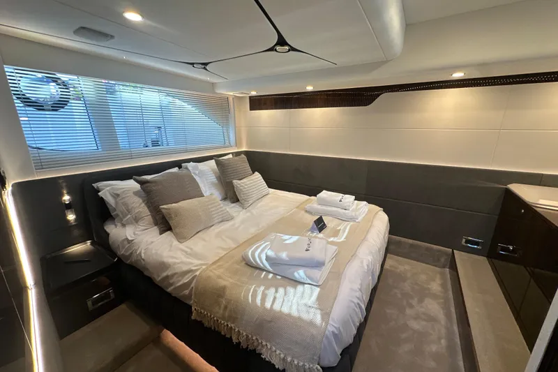 Slide: The Image of Luxurious bedroom interior of 2026 Fairline Targa 47 GT yacht with elegant bedding. - 39