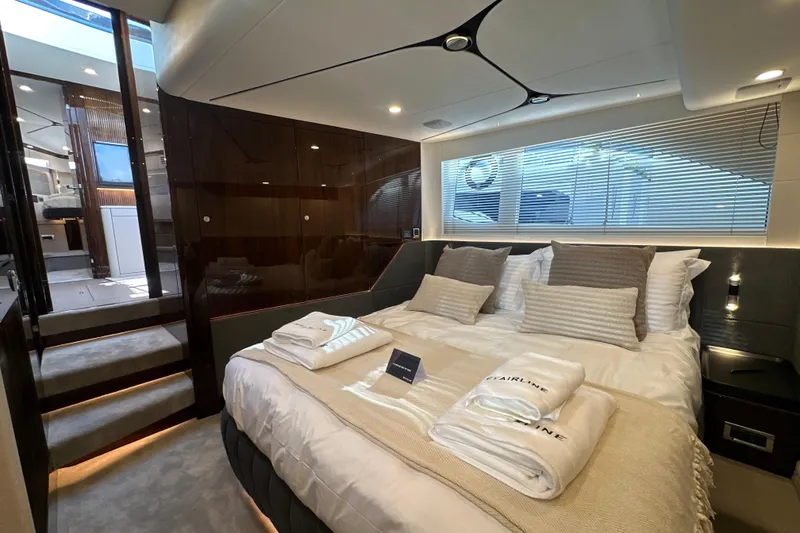 Slide: The Image of Luxurious bedroom interior of 2026 Fairline Targa 47 GT yacht with elegant bedding. - 41