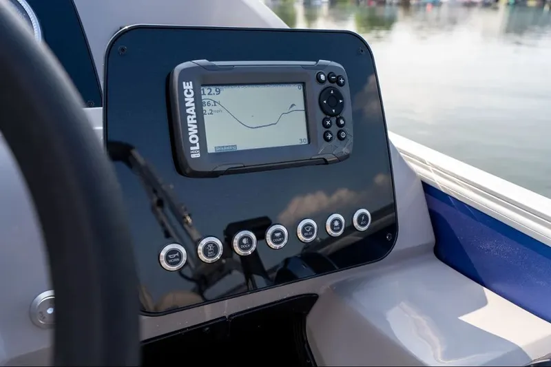Slide: The Image of 2024 Barletta Aria boat console with Lowrance GPS system. - 1