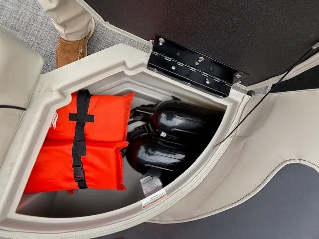 Slide: The Image of Storage compartment in 2024 Barletta Aria with life jacket and fenders. - 19