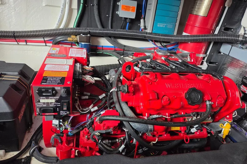 Slide: The Image of Engine compartment of a 2021 Regal 38 Grande Coupe with Westerbeke generator. - 5