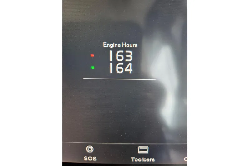 Slide: The Image of Display screen showing engine hours for a 2021 Regal 38 Grande Coupe. - 9