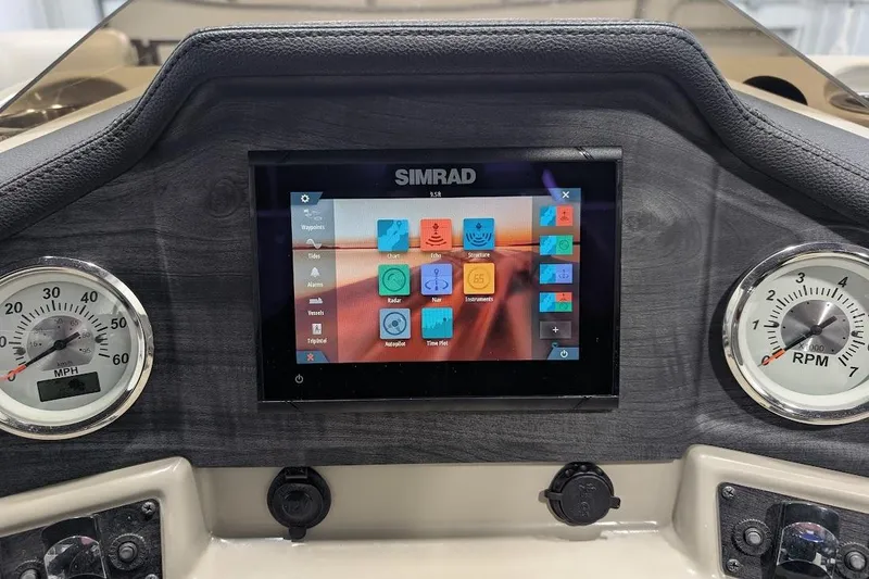 Slide: The Image of Dashboard of 2018 Lund LX220 Pontoon with Simrad display and gauges. - 18