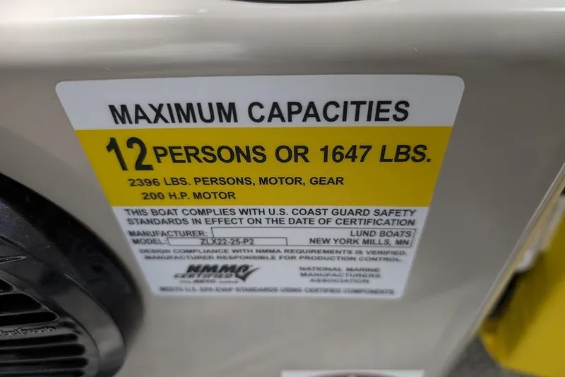 Slide: The Image of Maximum capacity label on 2018 Lund LX220 Pontoon, 12 persons or 1647 lbs. - 41