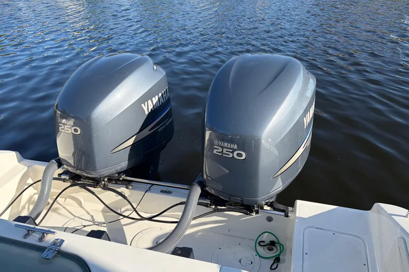 Slide: The Image of Twin Yamaha 250 outboard engines on a 2005 Pursuit 3370 Offshore boat. - 3