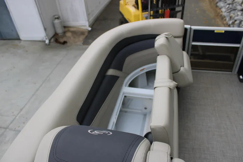 Slide: The Image of Interior seating of 2022 Baretta Cabrio C22CC boat, featuring beige and black upholstery. - 10
