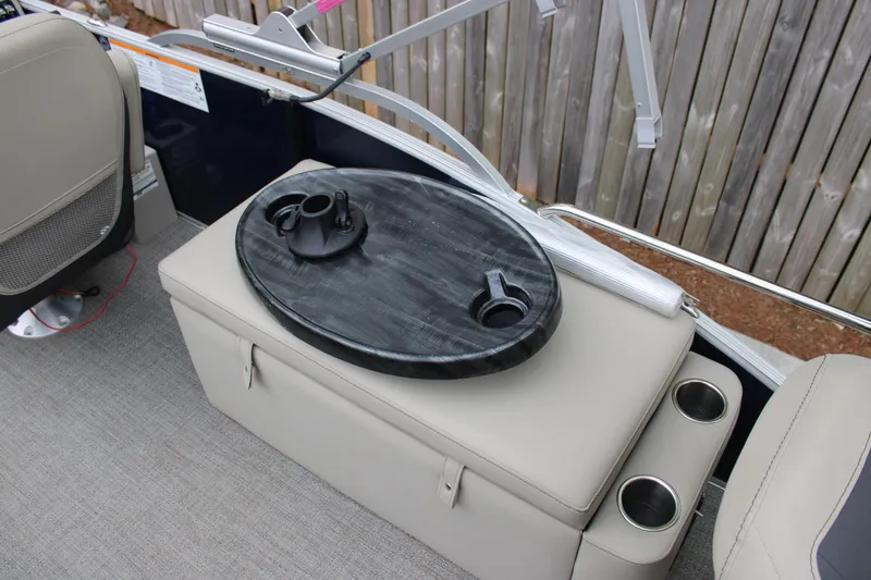 Slide: The Image of Interior of 2022 Baretta Cabrio C22CC boat with seating and table setup. - 15