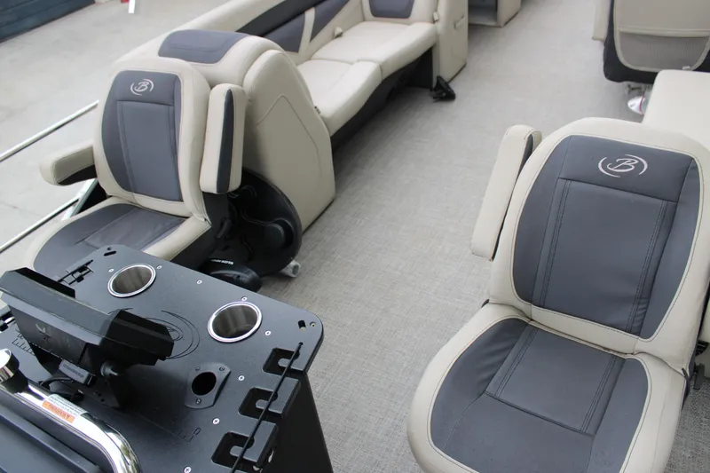 Slide: The Image of Interior of 2022 Baretta Cabrio C22CC boat with comfortable seating and control panel. - 18