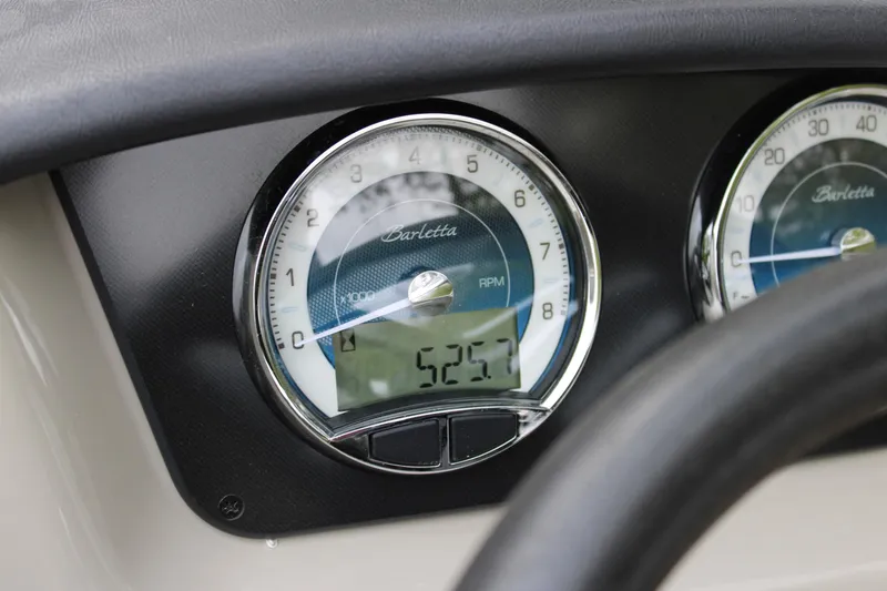 Slide: The Image of Close-up of 2022 Baretta Cabrio C22CC dashboard gauges displaying RPM and digital readout. - 8