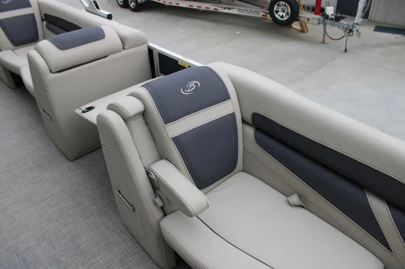 Slide: The Image of Luxurious seating in 2022 Baretta Cabrio C22CC boat, featuring elegant gray upholstery. - 9