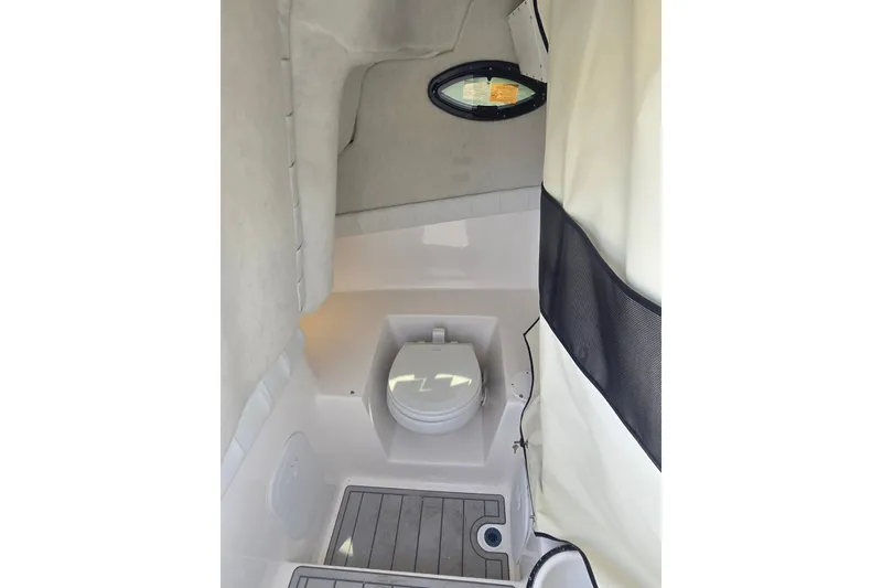 Slide: The Image of 2024 Sea Fox 248 Side Console boat with Yamaha engine on trailer, parked outdoors. - 6