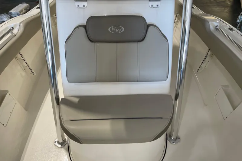 Slide: The Image of 2024 Key West 239 FS boat interior seating with stainless steel supports. - 12