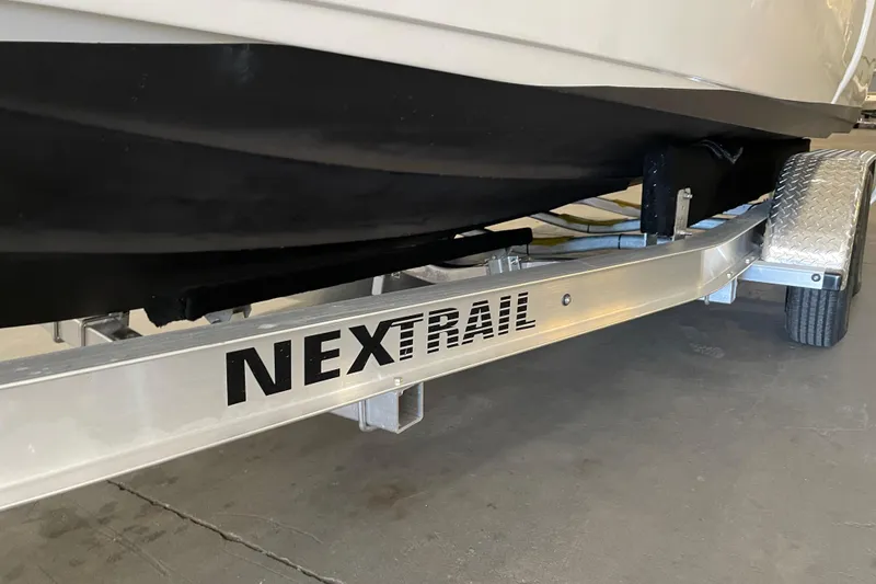 Slide: The Image of Trailer for 2024 Key West 239 FS boat, featuring NexTrail branding. - 25