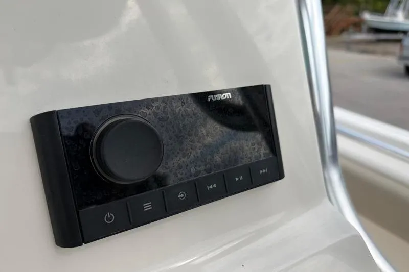 Slide: The Image of Close-up of Fusion audio control panel on 2024 Key West 239 FS boat. - 30