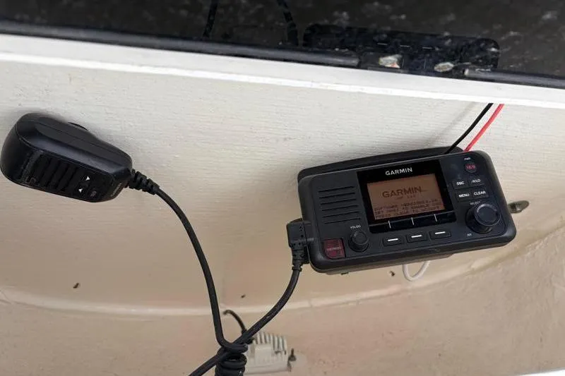 Slide: The Image of Garmin marine radio installed on 2024 Key West 239 FS boat dashboard. - 32