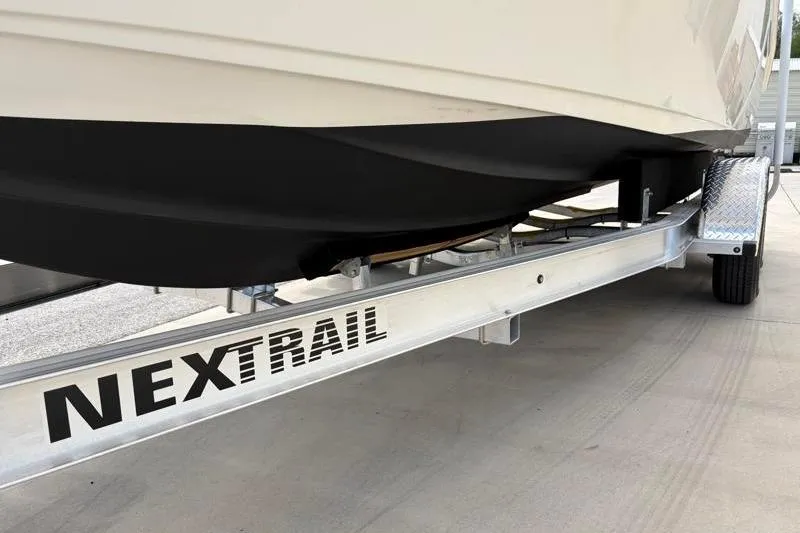 Slide: The Image of 2024 Key West 239 FS boat on Nextrail trailer, close-up view. - 42