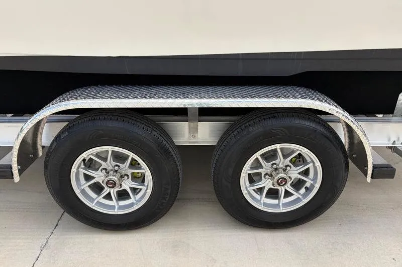 Slide: The Image of 2024 Key West 239 FS trailer with dual wheels and metal fender. - 43
