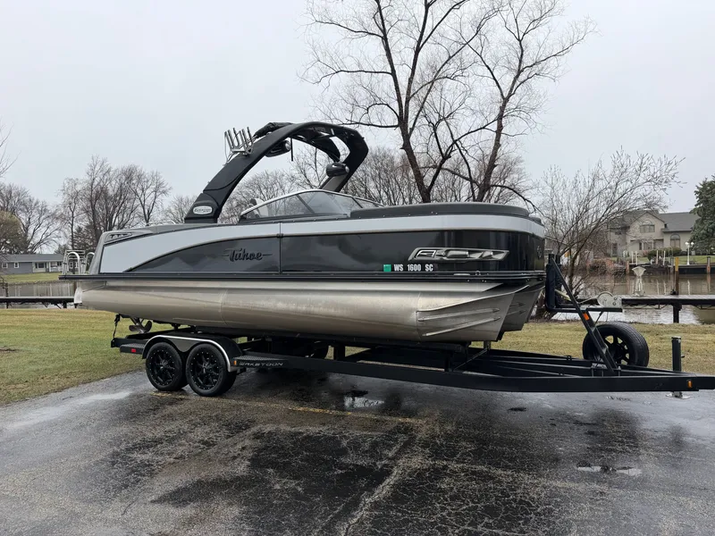 The Image of 2023 Tahoe WAKETOON boat on trailer, ready for adventure. - 0