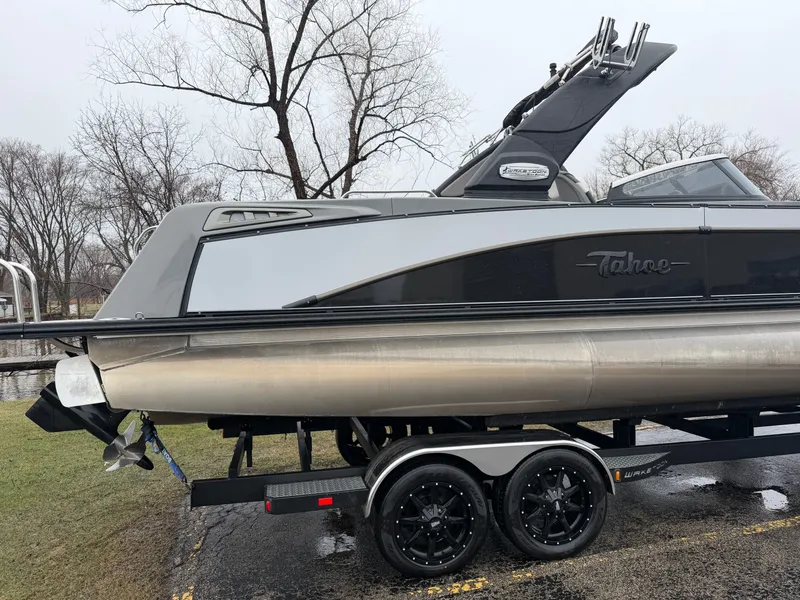 Slide: The Image of 2023 Tahoe WAKETOON boat on trailer, side view. - 1