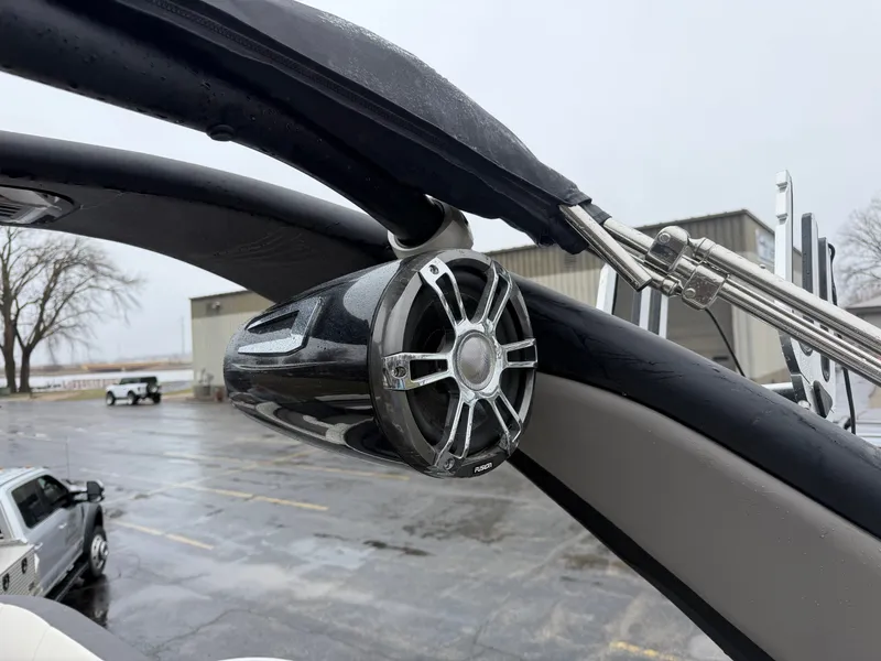 Slide: The Image of 2023 Tahoe WAKETOON boat speaker on wet deck. - 13