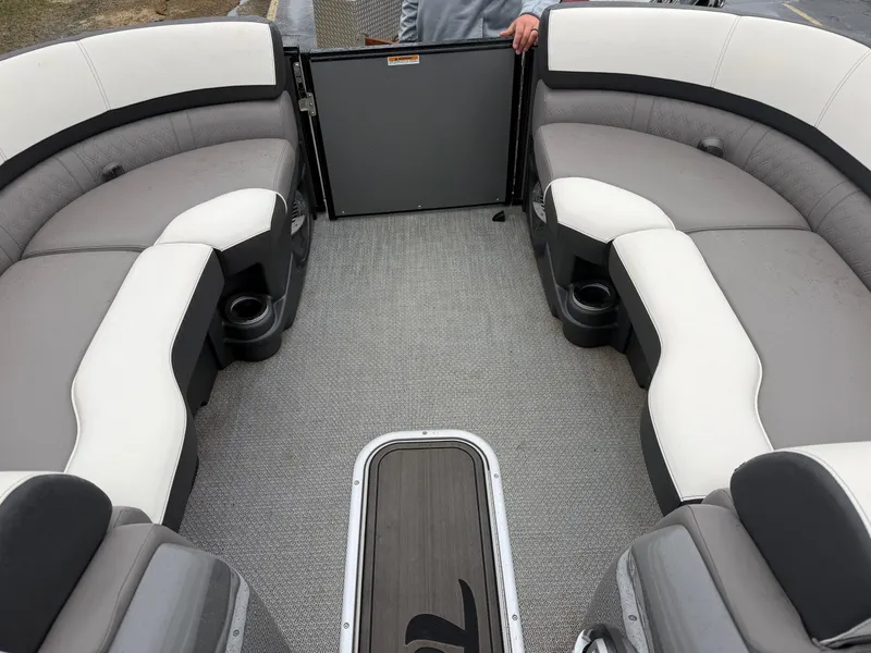Slide: The Image of Interior of a 2023 Tahoe WAKETOON boat with gray and white seating. - 14