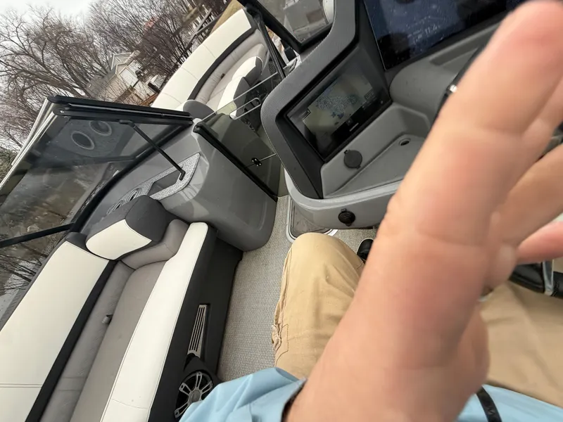 Slide: The Image of Interior of a 2023 Tahoe WAKETOON boat with modern features. - 18