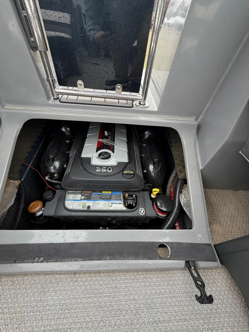 Slide: The Image of Engine compartment of a 2023 Tahoe WAKETOON boat with 350 HP engine. - 20