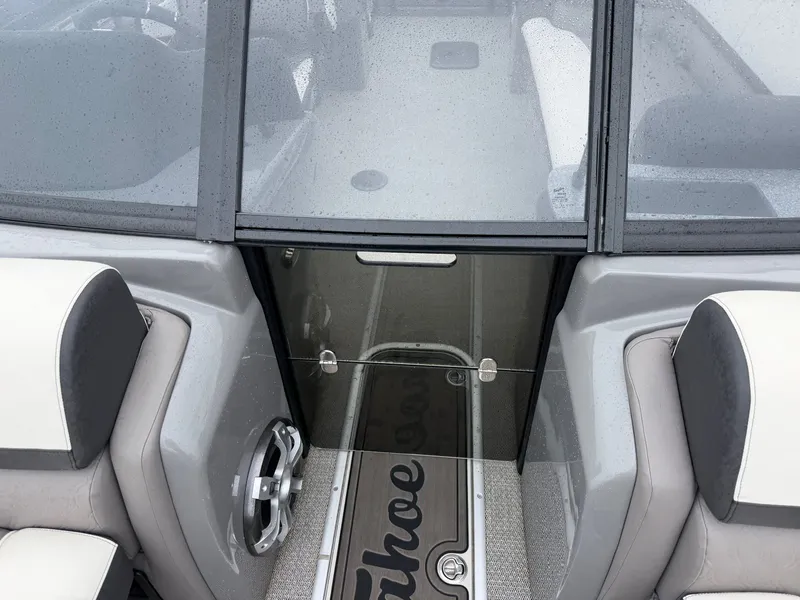 Slide: The Image of Interior of a 2023 Tahoe WAKETOON boat with gray seating. - 3