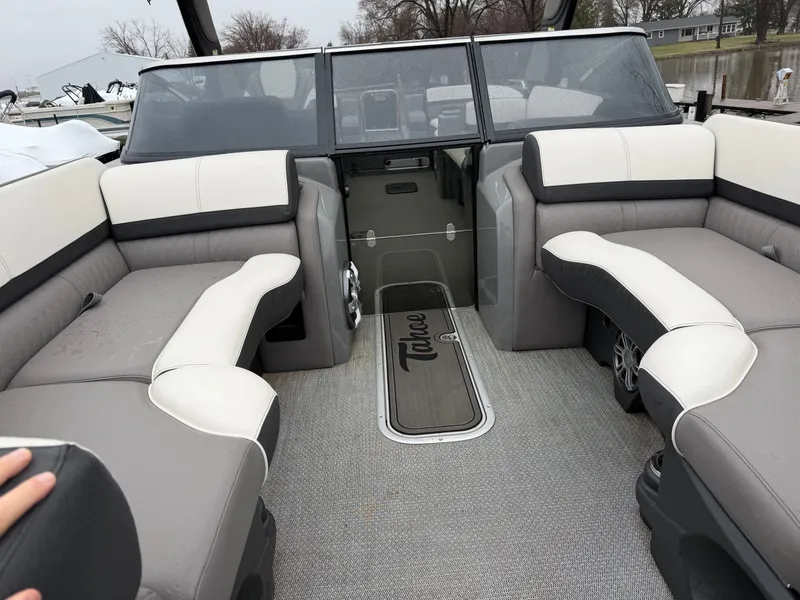 Slide: The Image of Interior of 2023 Tahoe WAKETOON boat with gray and white seating. - 4