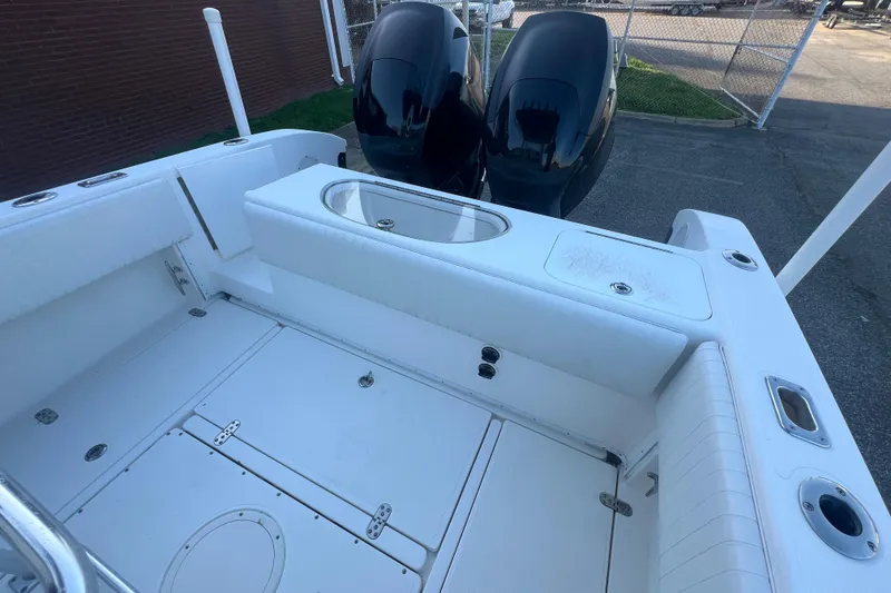 Slide: The Image of 2006 Fountain 23 Center Console boat with dual engines and spacious deck layout. - 28