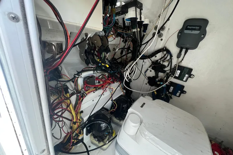 Slide: The Image of Electrical wiring and components inside a 2006 Fountain 23 Center Console boat. - 34