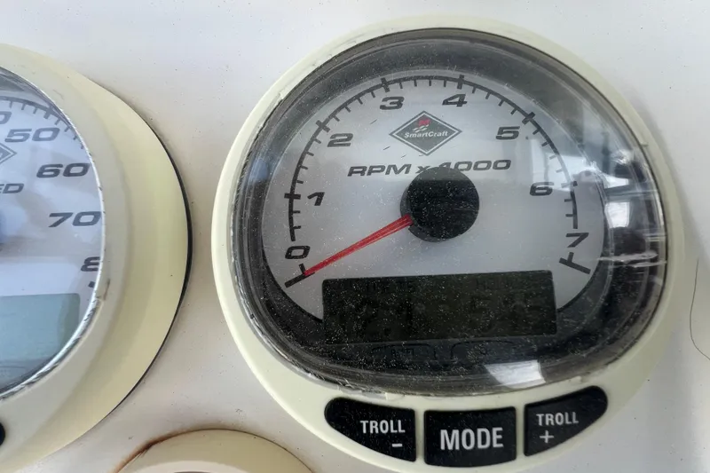 Slide: The Image of Close-up of a 2006 Fountain 23 Center Console tachometer, displaying RPM x 4000 gauge. - 49