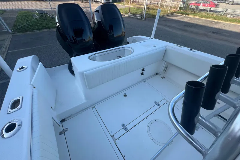 Slide: The Image of 2006 Fountain 23 Center Console boat with dual engines and spacious deck layout. - 51