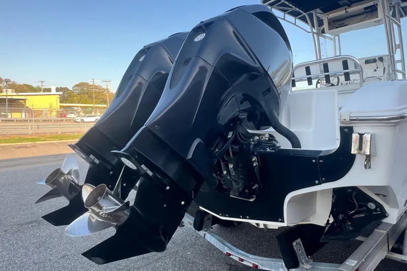 Slide: The Image of Twin outboard motors on a 2006 Fountain 23 Center Console boat. - 6