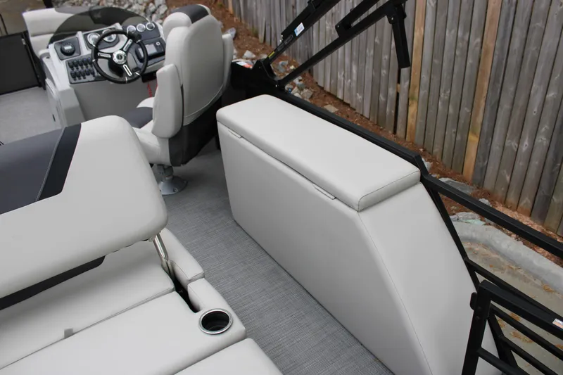 Slide: The Image of 2023 SunChaser Geneva Sport 23 SB interior with steering console and seating. - 13