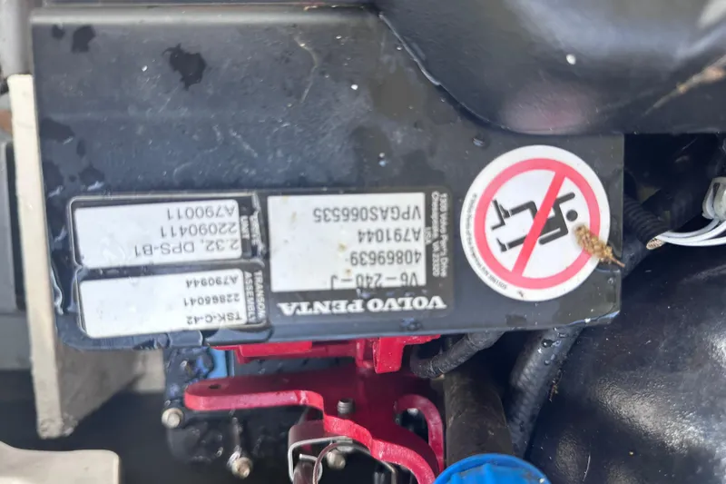 Slide: The Image of Close-up of a Volvo Penta engine component in a 2018 Regal 22 FasDeck boat. - 37