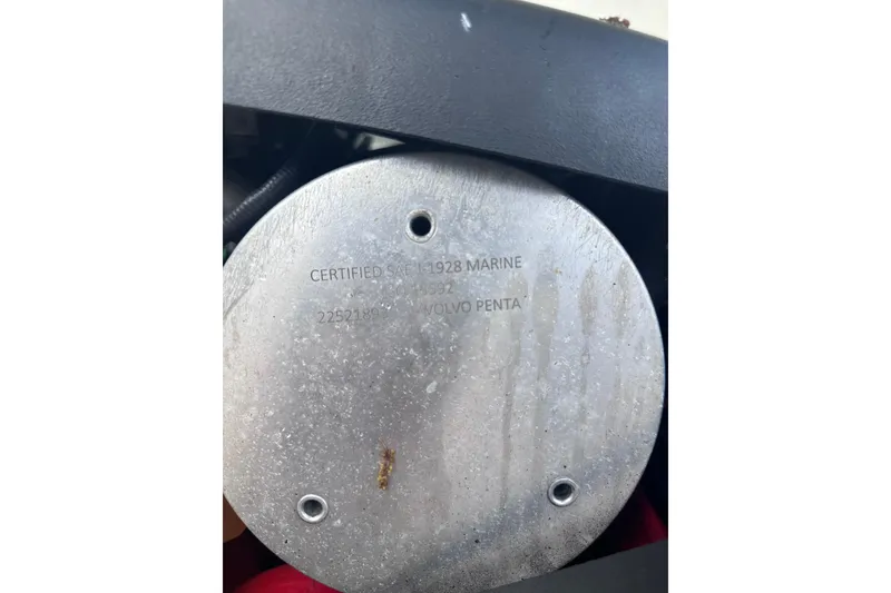 Slide: The Image of Close-up of a Volvo Penta marine engine component in a 2018 Regal 22 FasDeck boat. - 38