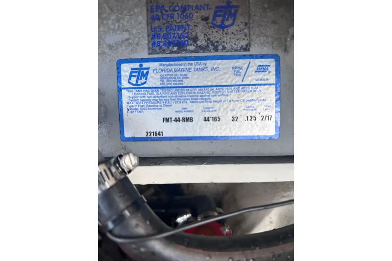 Slide: The Image of Label on Florida Marine Tanks, Inc. component for 2018 Regal 22 FasDeck boat. - 40