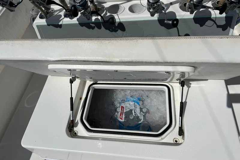 Slide: The Image of Open cooler with ice and drinks on a 2008 Contender 31 Tournament boat. - 15