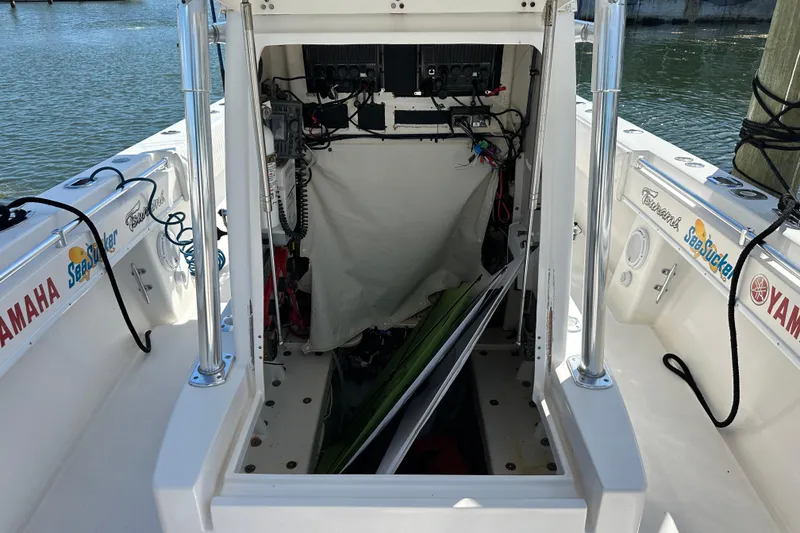 Slide: The Image of 2008 Contender 31 Tournament boat interior with equipment and storage area. - 5