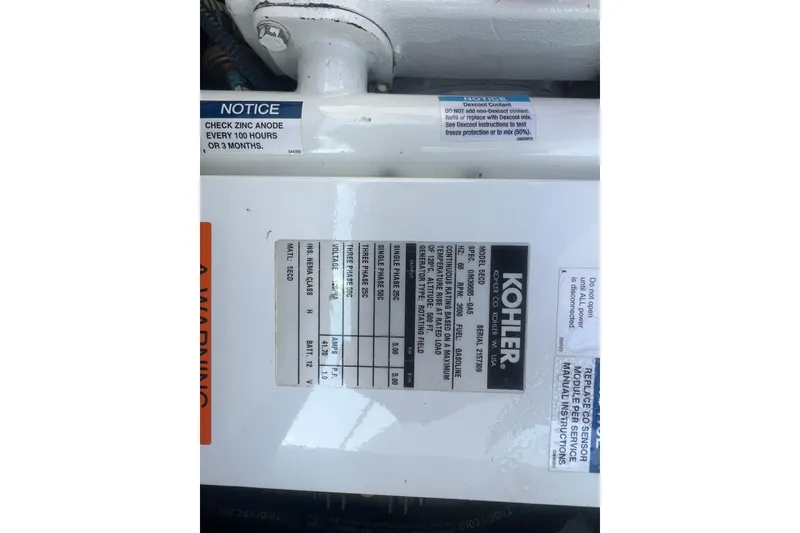 Slide: The Image of Engine compartment of a 2008 Formula 310 Sun Sport with Kohler generator label. - 17