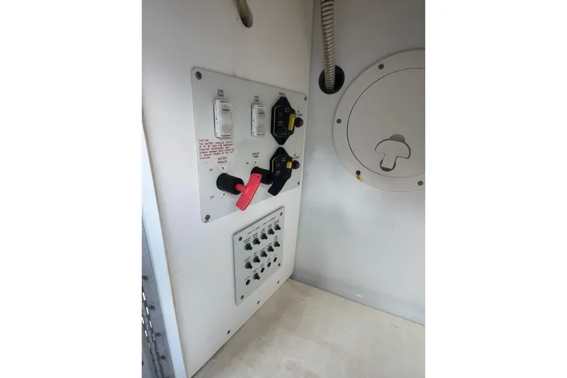 Slide: The Image of Control panel of a 2008 Formula 310 Sun Sport boat, featuring switches and dials. - 18