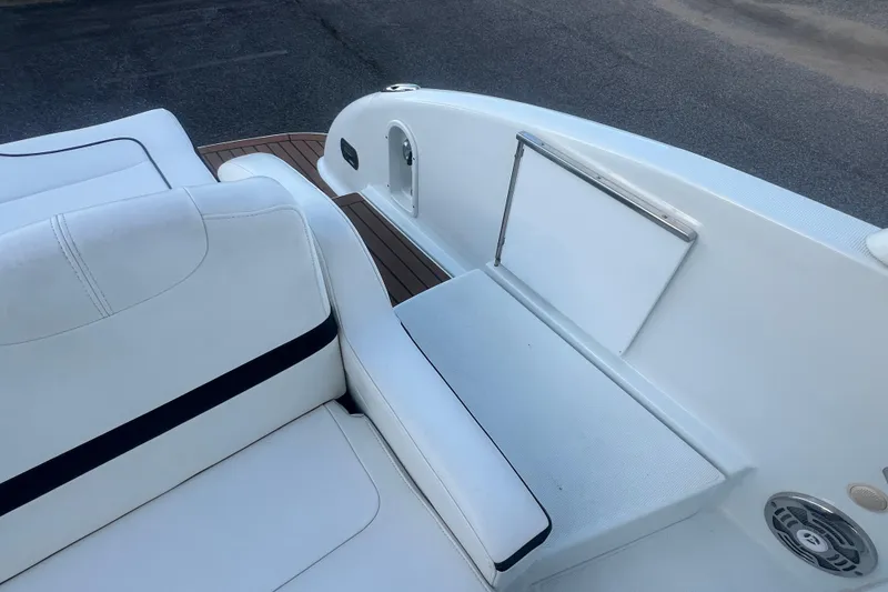Slide: The Image of 2008 Formula 310 Sun Sport boat interior with white seating and teak flooring. - 20