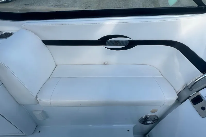 Slide: The Image of 2008 Formula 310 Sun Sport boat interior with white seating and sleek design. - 24