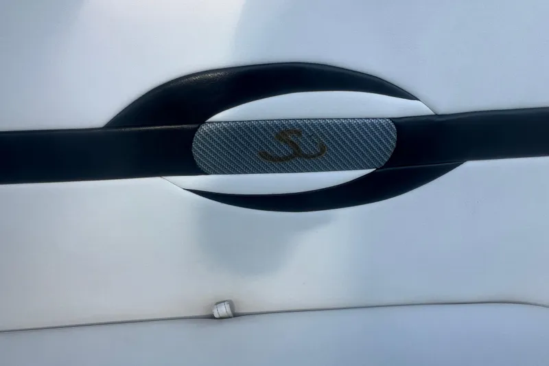 Slide: The Image of Interior detail of a 2008 Formula 310 Sun Sport boat, featuring sleek design elements. - 25