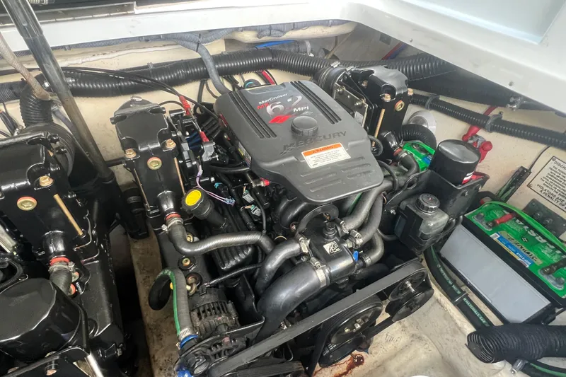 Slide: The Image of Engine compartment of a 2008 Formula 310 Sun Sport boat with Mercury engine. - 33