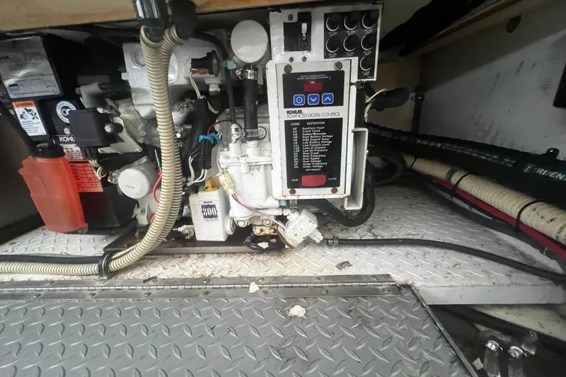 Slide: The Image of Engine compartment of a 2008 Formula 310 Sun Sport boat with Kohler generator. - 34