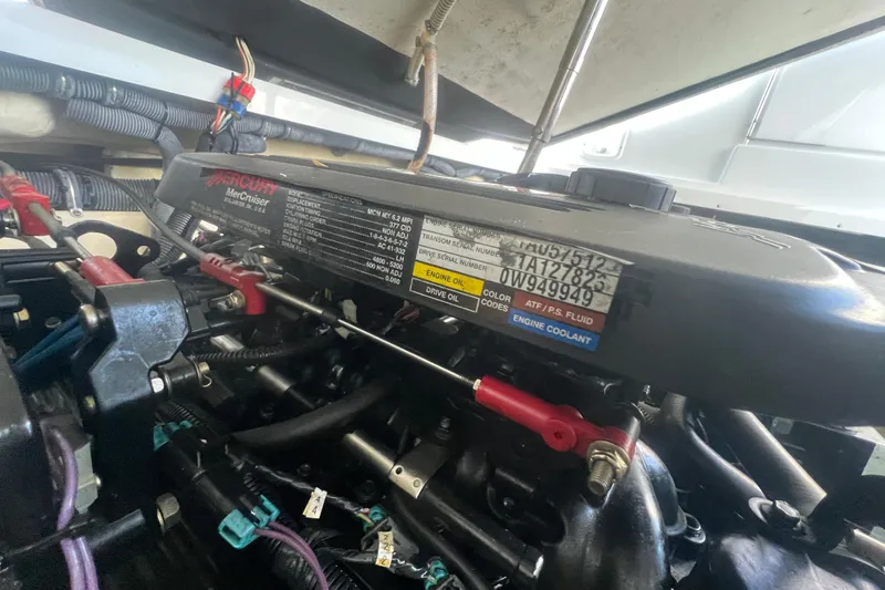 Slide: The Image of Engine compartment of a 2008 Formula 310 Sun Sport boat, featuring a MerCruiser engine. - 38