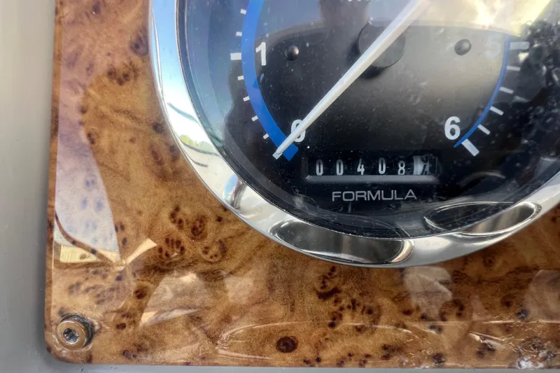 Slide: The Image of Close-up of a 2008 Formula 310 Sun Sport speedometer with wood grain panel. - 39