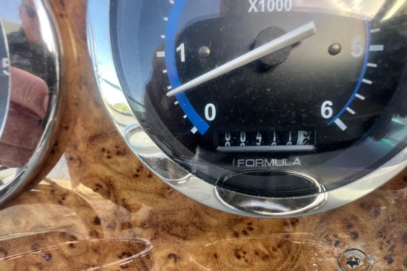 Slide: The Image of Close-up of 2008 Formula 310 Sun Sport speedometer with wood grain dashboard. - 40